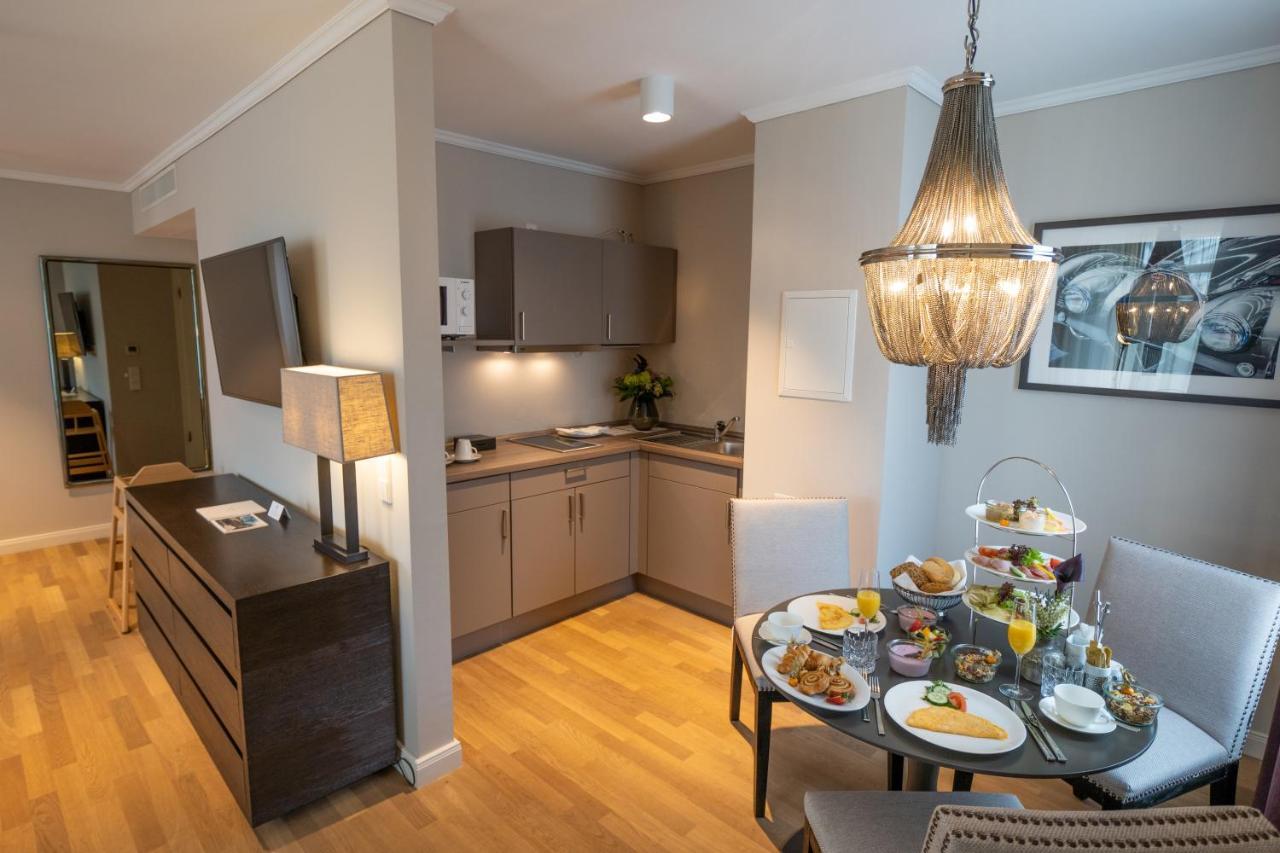Vila Vita Rosenpark Marburg Bagian luar foto A kitchen in a serviced apartment