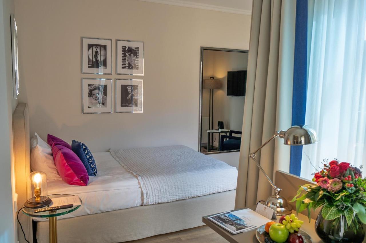 Vila Vita Rosenpark Marburg Bagian luar foto A room at the hotel