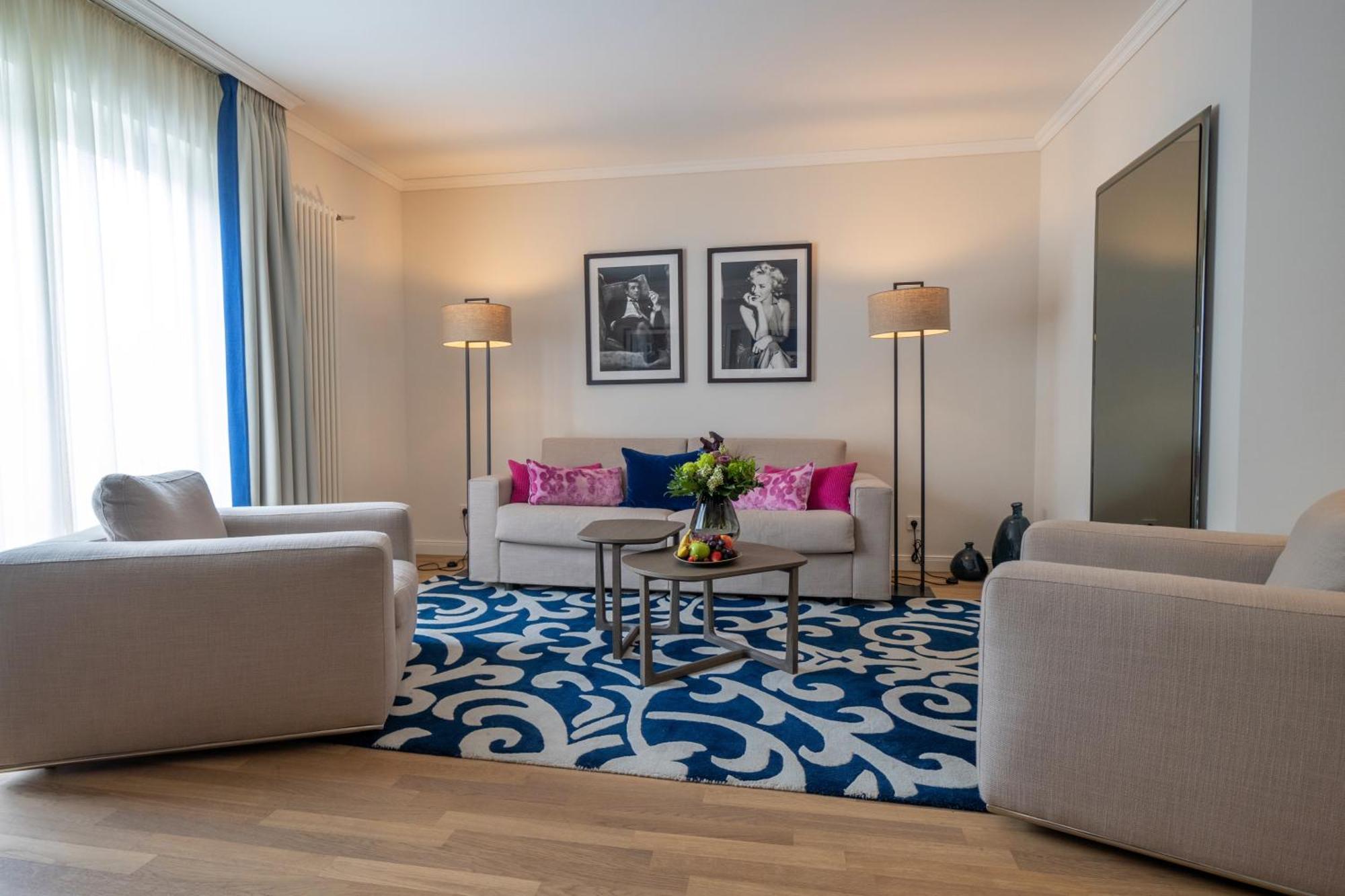 Vila Vita Rosenpark Marburg Bagian luar foto A living room at the Hotel